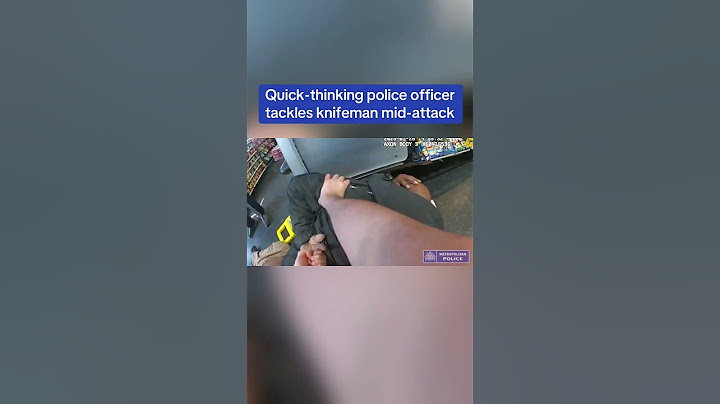Quick-thinking police officer tackles knifeman mid-attack