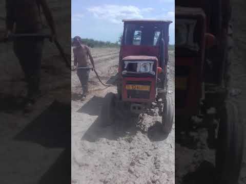 Vídeo: Per què surt el motor del meu tractor de gespa?