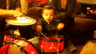 Crash and his drums! 9 1/2 months old!