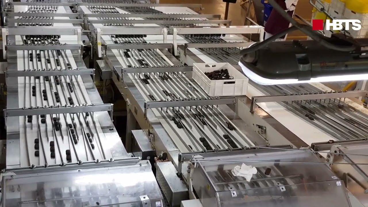 AUTOMATIC HANDLING LINE FOR BISCUITS AND SLUG LOADERS