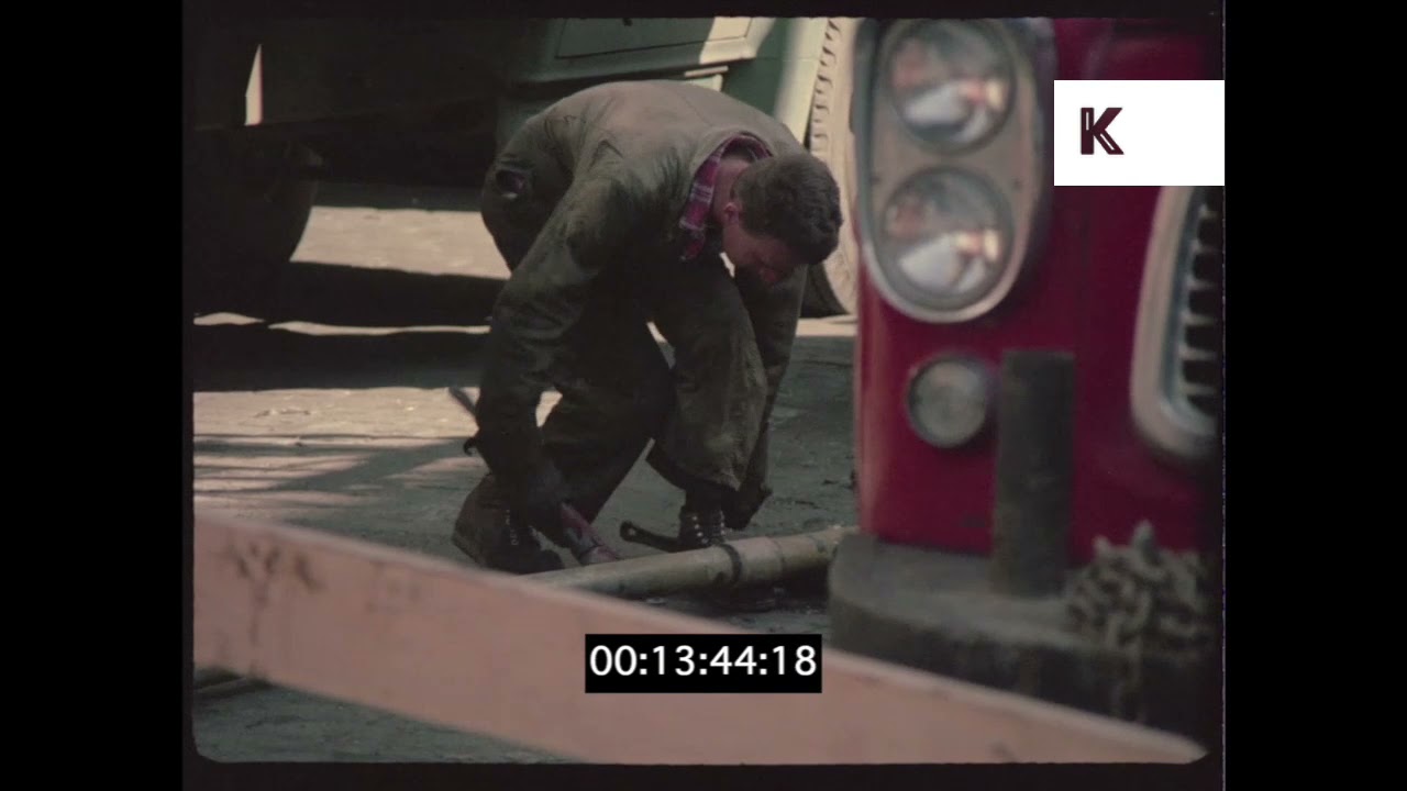 1960s New York, Mechanic Polishing Car in Garage, Blue-Collar Worker, 35mm