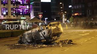 Netherlands: Damage and debris on Eindhoven streets in aftermath of anti-lockdown protest
