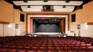 Blame It On The Boogie by The Jacksons playing in a empty auditorium