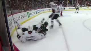 Bone-crunching hit by Clutterbuck @ Blackhawks