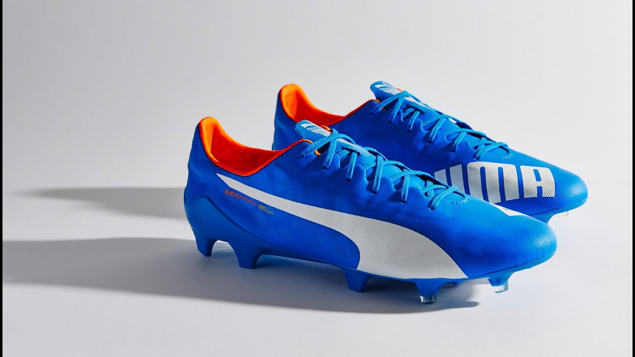 puma football boots orange and blue