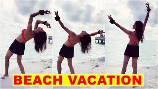 Sushmita Sen Flaunts Her Toned Body In A Scarlet Bikini Halter Top And Mini Skirt