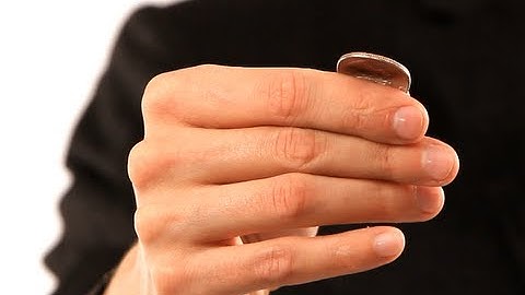 How to Do the Coin Bend Trick | Coin Tricks