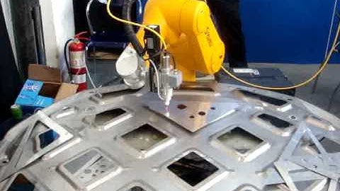Solid state laser cutting application with Staubli TX60 robot - 6 axis at eurobots.net