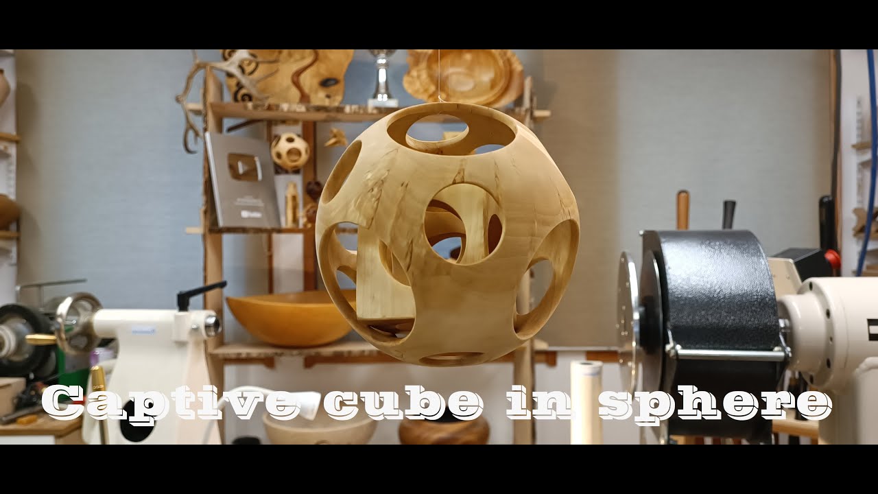 Woodturning - Captive cube in Sphere