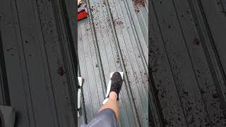 Walking on a wet metal roof! Part 2.