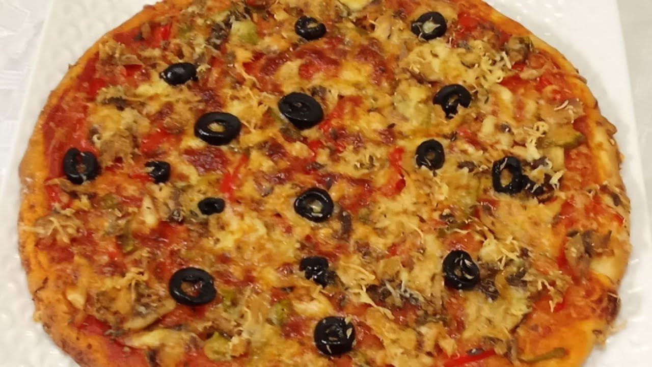 ب 2 كيسان دقيق حضري 2بيتزات من أروع وأسهل بيتزا بحال ديال المطاعم كلشي في دقة وحدة