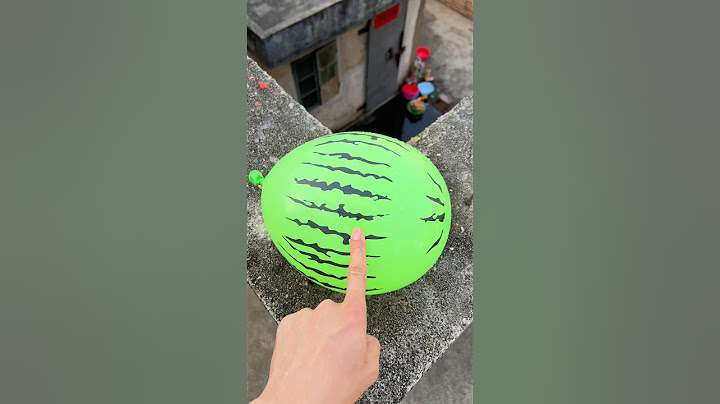 Experiment: Will a water balloon explode if it rolls down from a tall building? 💥 #balloon