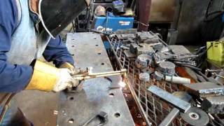 Using a cutting torch 1/4" plate