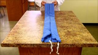 Folding a Surgery Gown