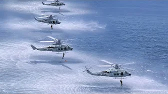 US Helicopters Dropping Elite Troops Into the Ocean
