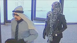 Photos of armed bank robbery suspects