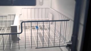 How to Remove the Top Rack Inside the Freezer Compartment of a Whirlpool Bottom-Mount Refrigerator