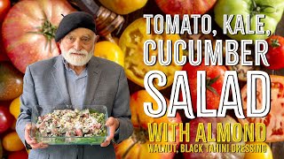 Tomato, Kale, Cucumber Salad with Almond, Walnut, Black Tahini Dressing
