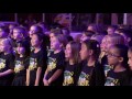 Zach Elementary Green Choir sings the National Anthem