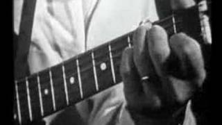 Video thumbnail of "Doc Watson-Deep River Blues"