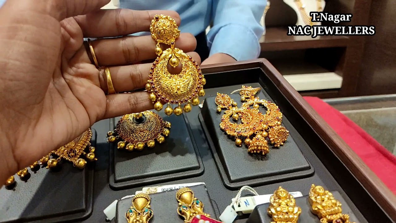 NAC Jewellers - Jhumkas Diamond Earrings Diamond... | Facebook