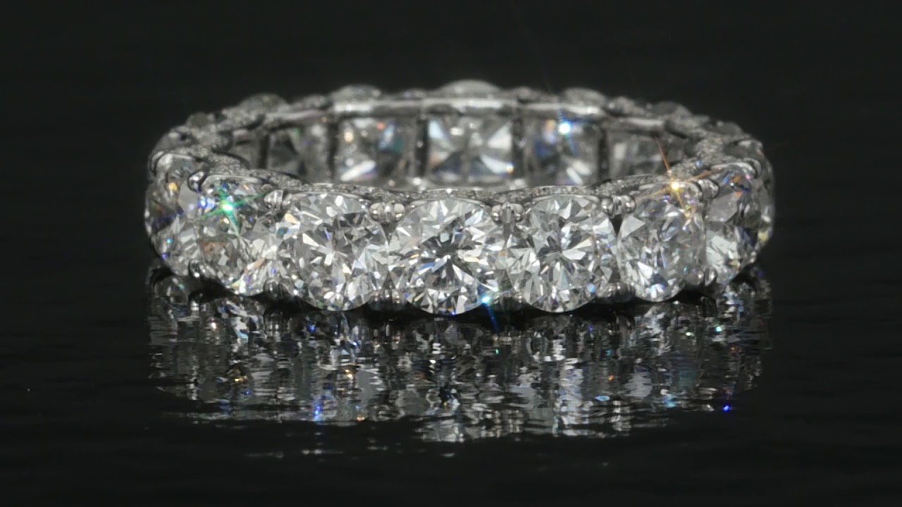 mike nekta eternity ring with micro pave diamonds on the u shaped prong