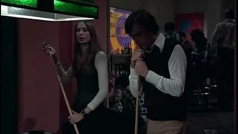 Deborah Raffin plays pool with Edward Albert
