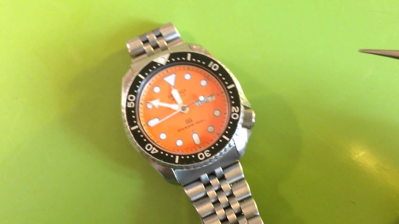 SOLD - Seiko 7548-700C orange-dialed diver - YouTube