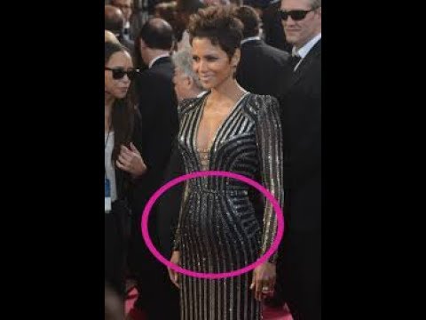 Halle Berry, 50, sparks pregnancy rumours as she appears on red carpet proudly ...