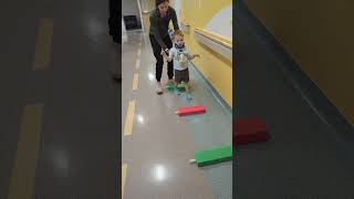 Tavi in physical therapy at Seattle Children's Hospital
