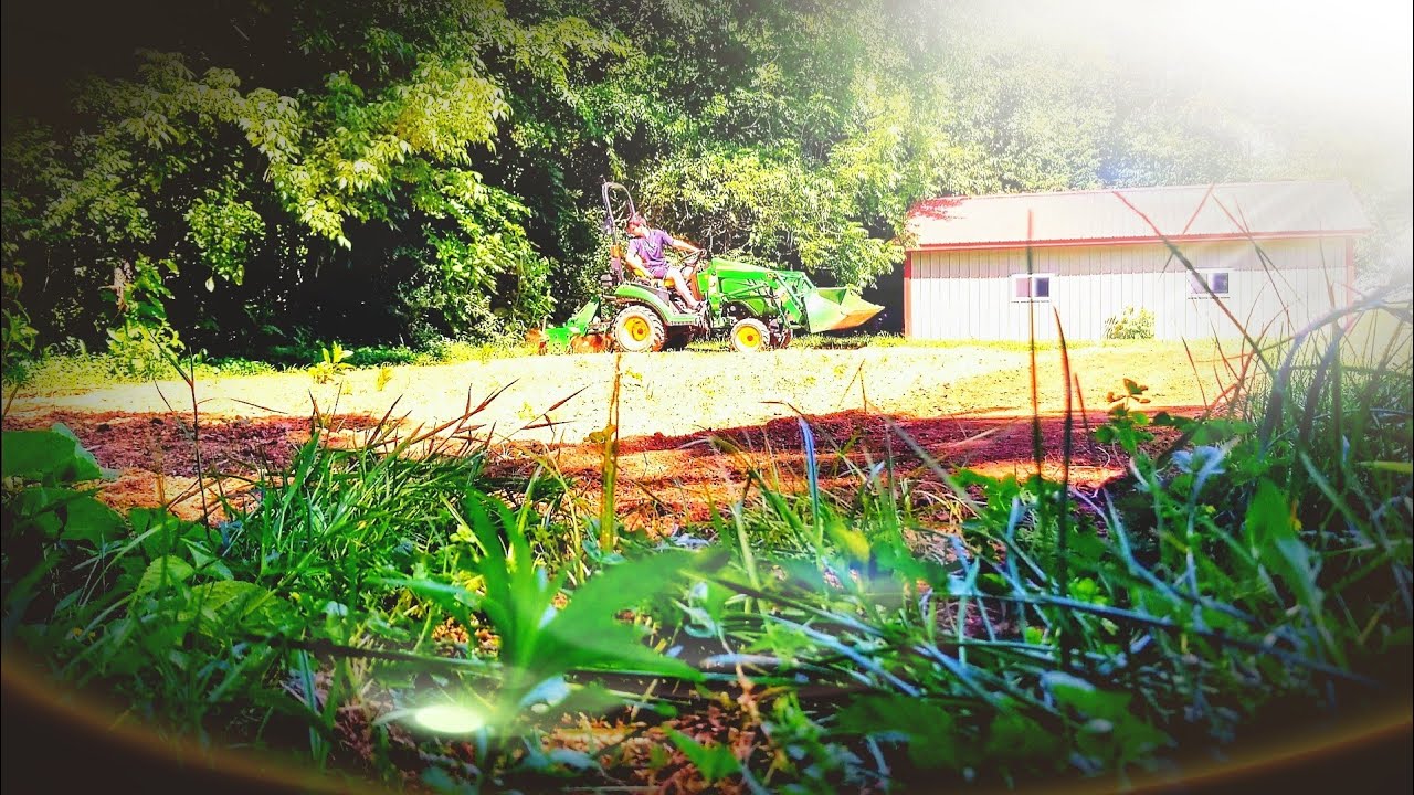 John Deere 1025R Tilling the Garden - YouTube