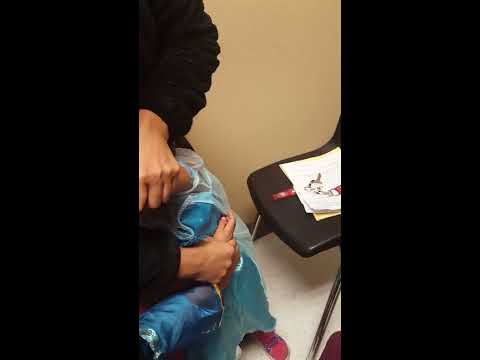 Isabella getting shots