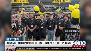 New store opening celebrated with donation to community college