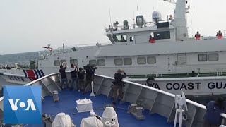 Chinese Coast Guard Ship Nearly Collides with Philippines Patrol Ship in South China Sea | VOA News