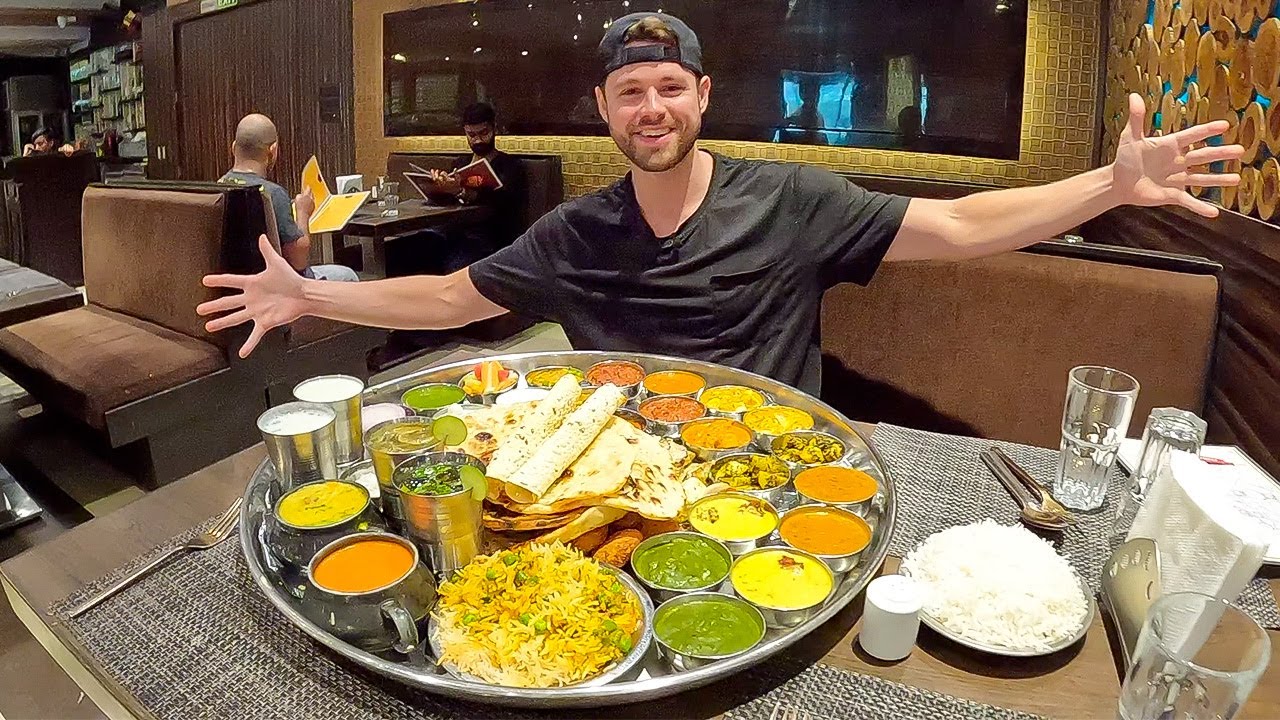 First time trying a 44+ dish Punjabi Thali with @Desi Chris