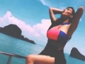 Kim Kardashian Complements Bikini Pics With Homemade 'Bond' Videos