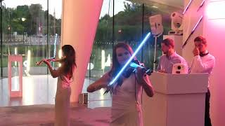 LED electric violin duo performing at White Party