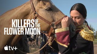 Lily Gladstone Feeds a Horse On Set
