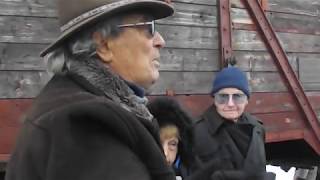 Stanley Kalmanowitz, survivor, on Auschwitz platform describes his experiences after his arrest