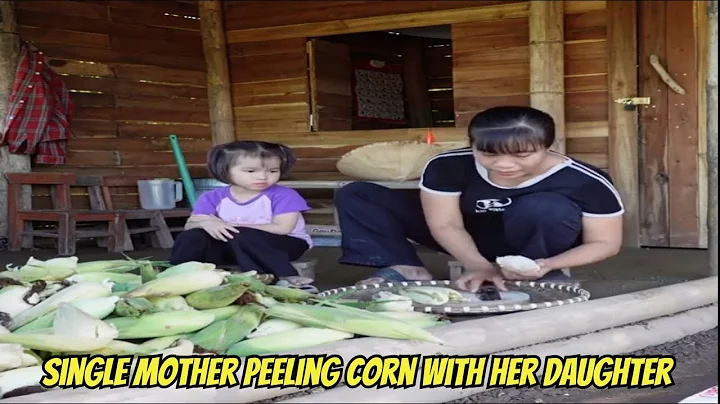 Single mother peeling corn with her daughter.