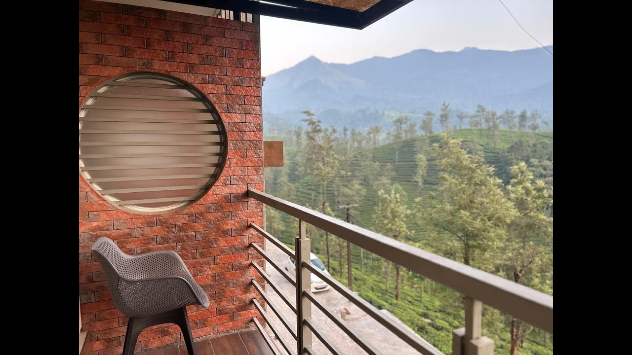 Couple- friendly stay with mountain & tea plantation views in Wayanad 