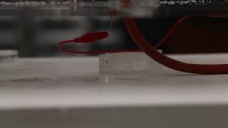 70 kV DC arcing to acrylic piece