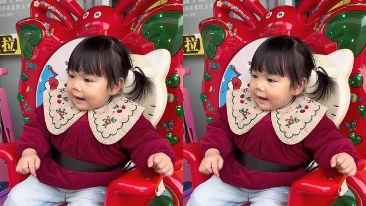 盈妹妹一出门就要坐摇摇车，不坐完都不愿回家