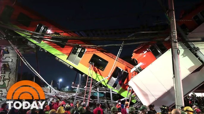 Bystanders Gather Around Collapsed Shopping Mall in Mexico City