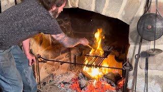 Open fireplace cooking at the cabin (hamburger)