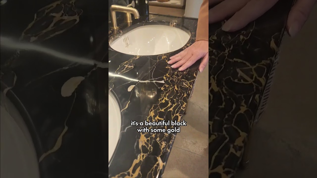 Bathroom Remodeling Ideas Unique marble vanity paired with the custom fixtures