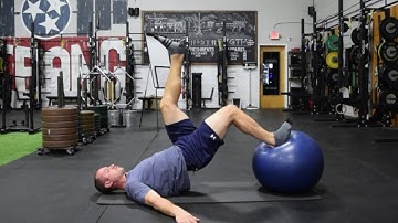 5 Ground-Based Exercises to Improve Hamstring Strength & Resilience: Single Leg Eccentric Ball Curl