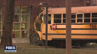 School bus hits MCTS bus, Milwaukee library | FOX6 News Milwaukee
