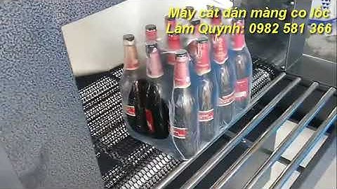 Máy màng co, máy cắt dán co màng lốc  chai lon bán tự động, máy cắt dán màng co lốc