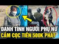 Danh tính người phụ nữ 'ĐI DÉP LÊ' cầm cọc tiền 500k phát cho người 'ĐI XE MÁY VỀ QUÊ' tránh dịch